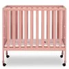 Jett Dusty Modern Nursey Adjustable Mattress Support Included 1.5 in. Mattress Pink Non-Full Size Folding Crib by Dream On Me